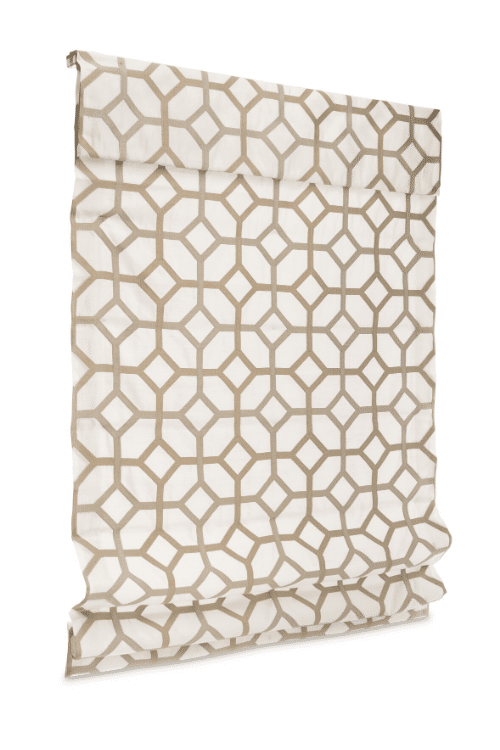 Fully extended Roman Shades with gold and white geometric pattern on a white background