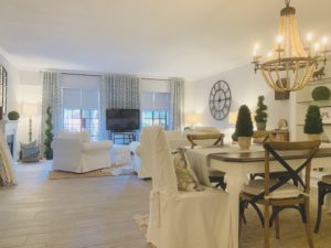 Relaxed-fit Roman Shades in white, in a white-trimmed Buckhead, GA condo