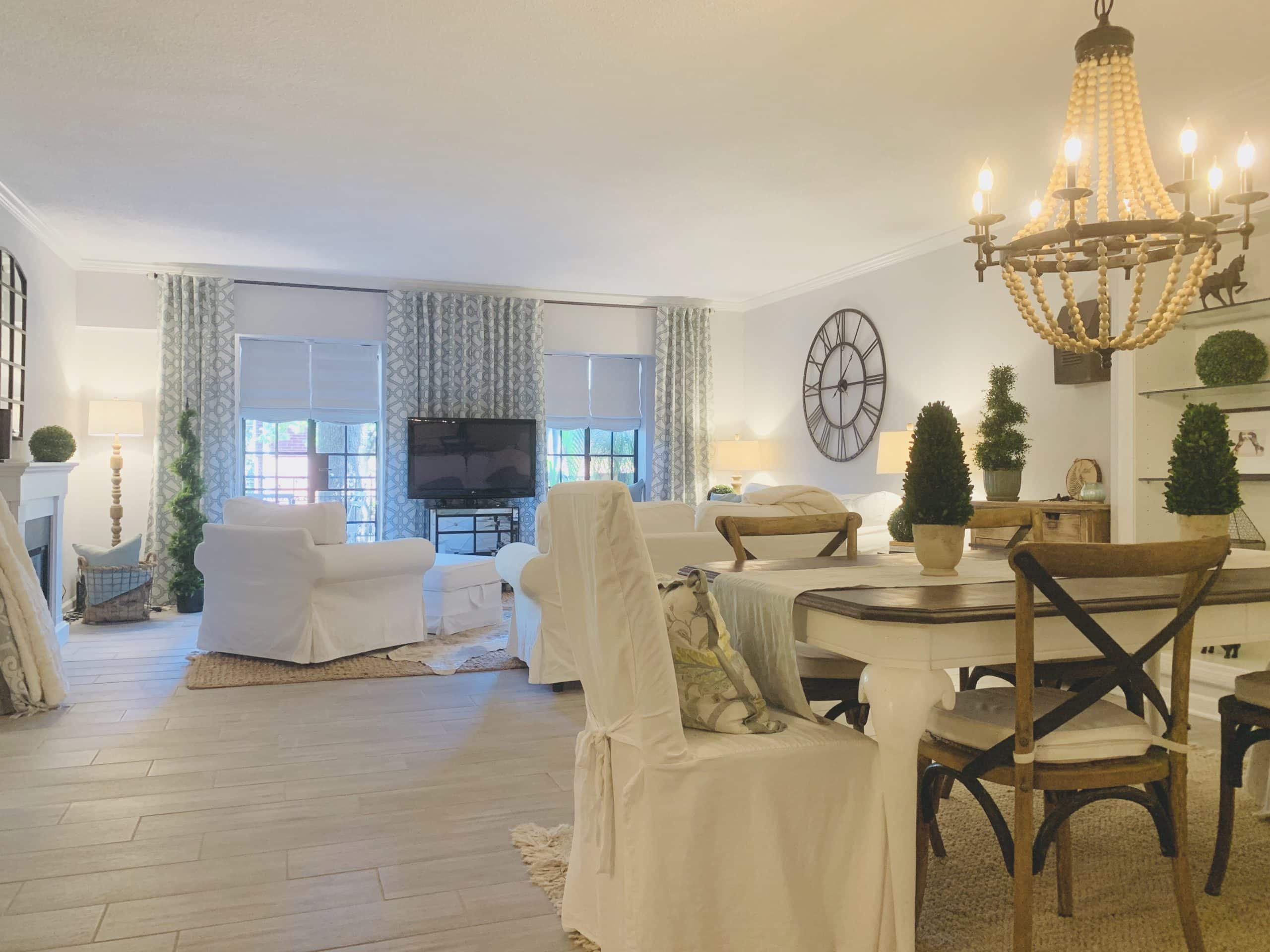 Relaxed-fit Roman Shades in white, in a white-trimmed Buckhead, GA condo