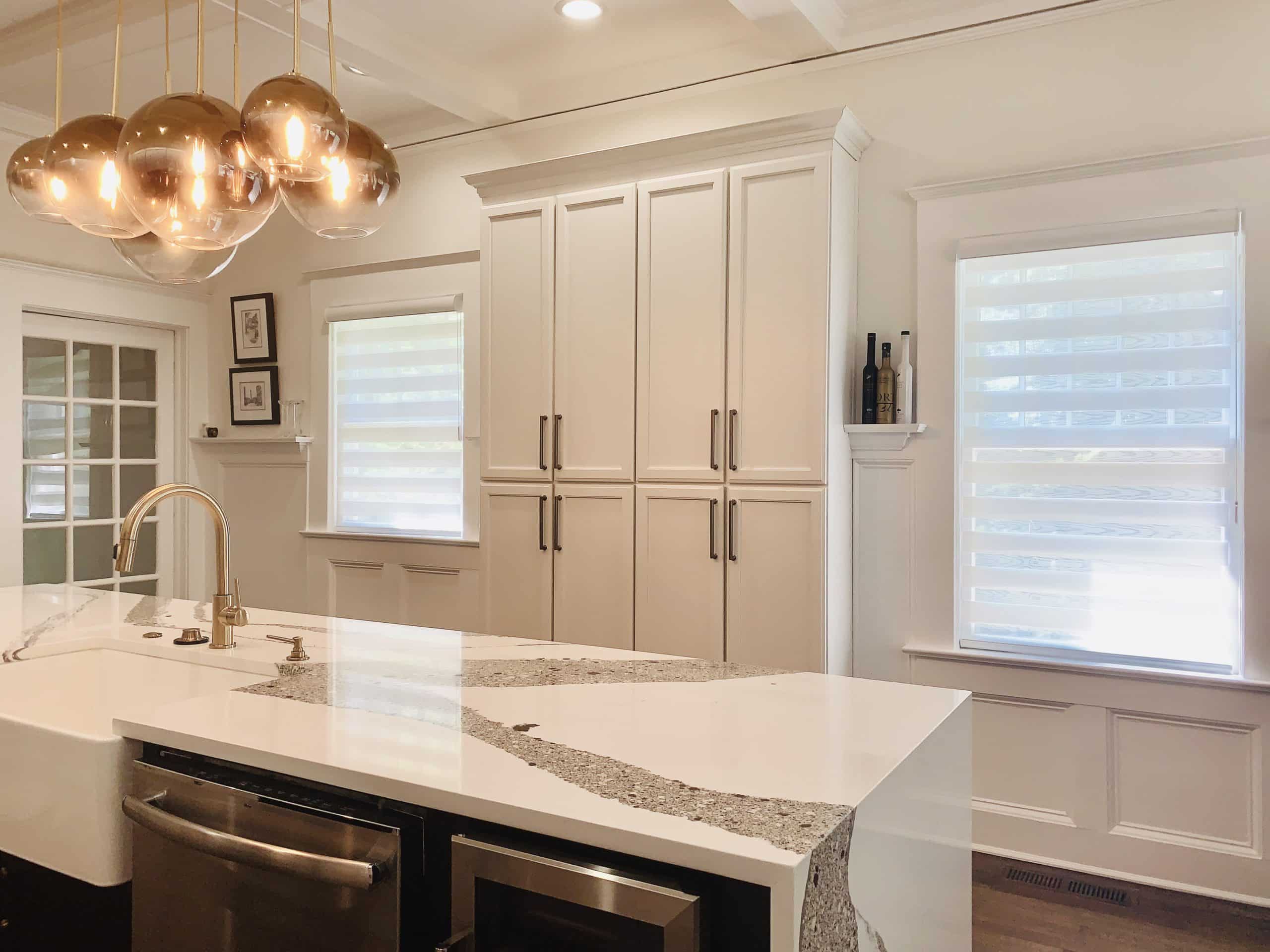 Layered Shades, also known as Zebra shades, on two windows in an Atlanta, GA kitchen