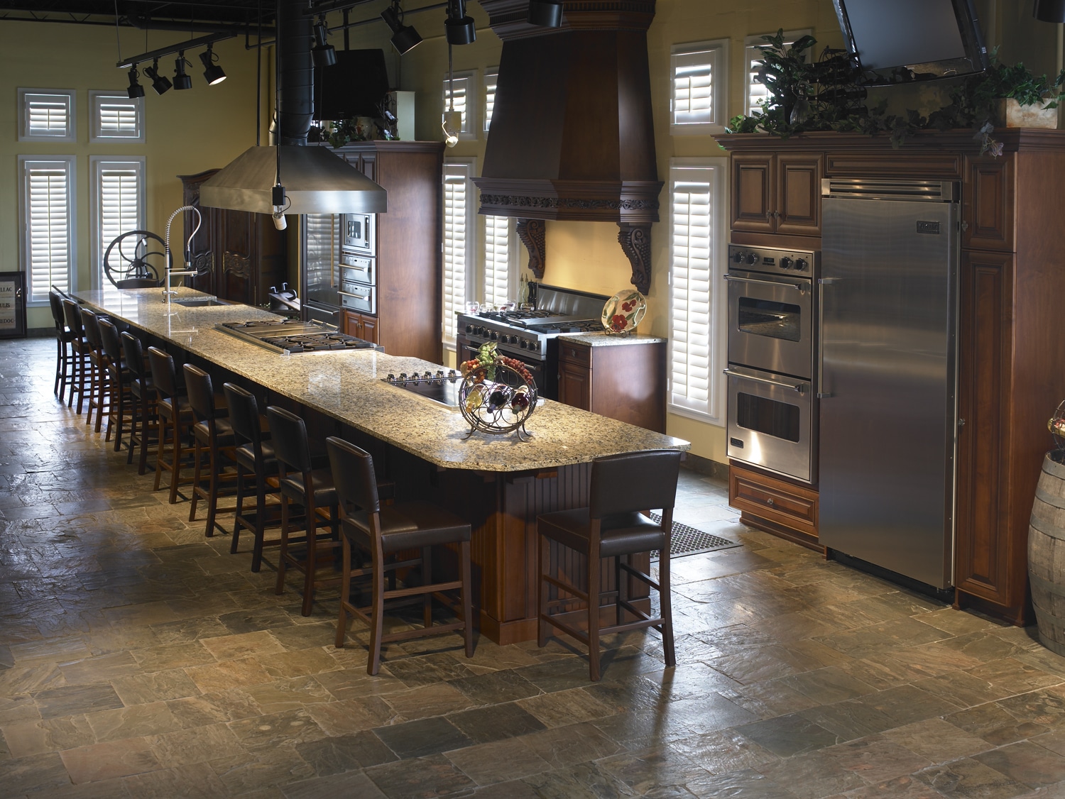 White Hardwood Plantation Shutters with 3.5 inch louvers in the Chateau Elan kitchen in Braselton, GA