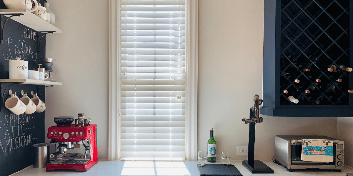 White, Corded Faux Wood Blinds with 2.5 inch slats in an Alpharetta, GA pantry