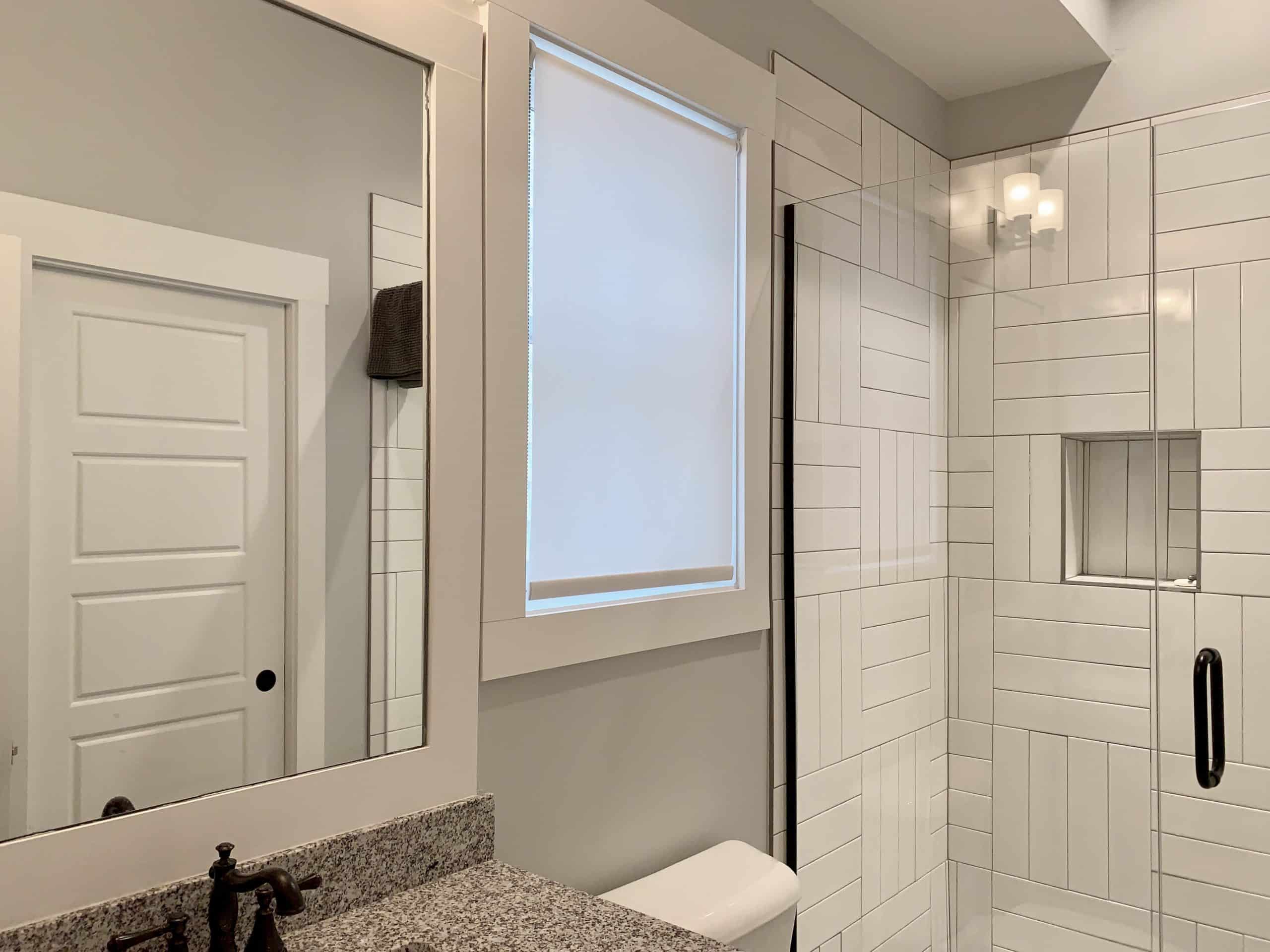 Custom Roller Shade gently diffuses light into this modern bathroom in Nashville, TN