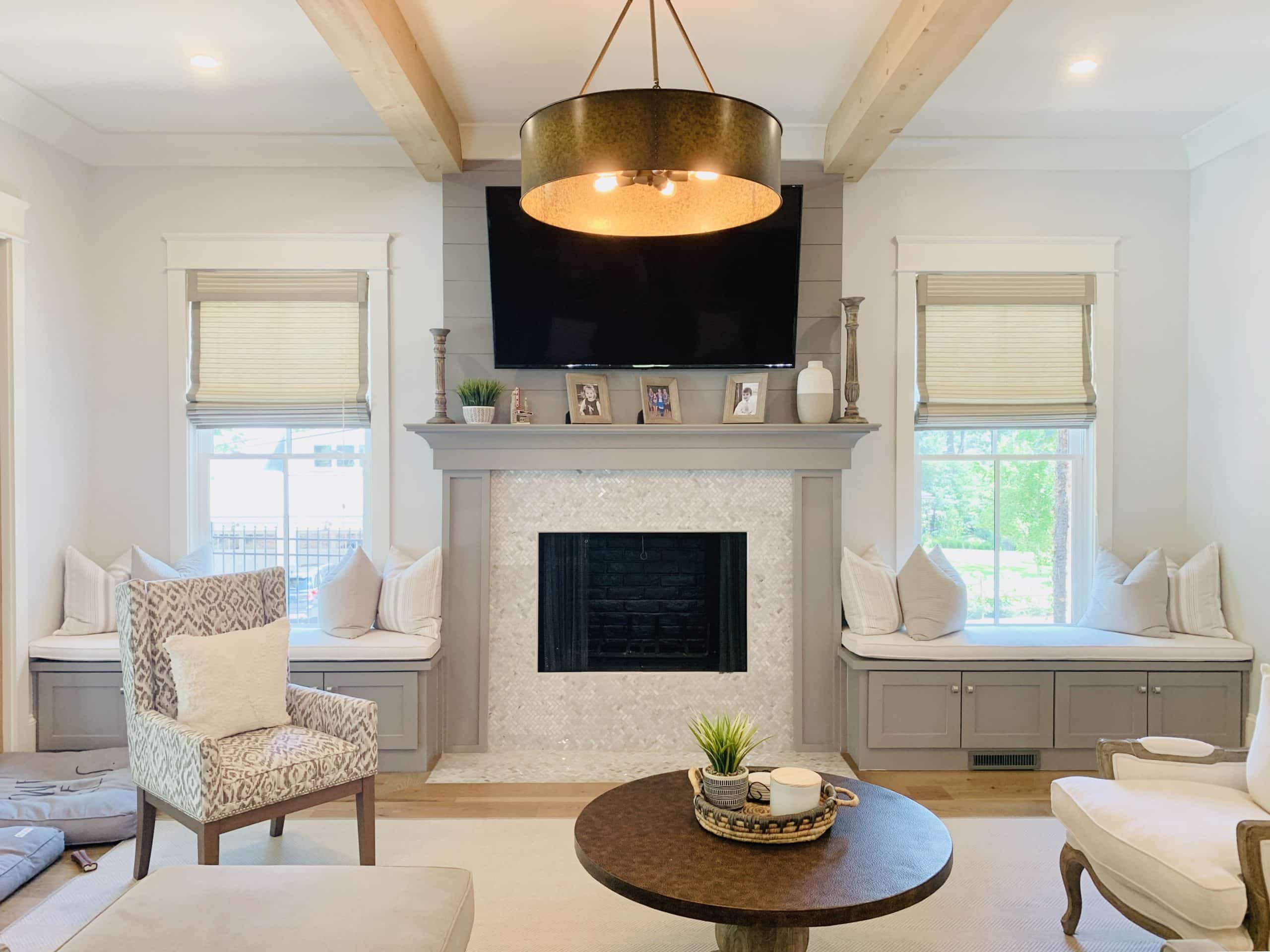 Grey Natural Woven Shades, also known as Tropical Woven Shades, with edge banding, in a living room in Atlanta, GA