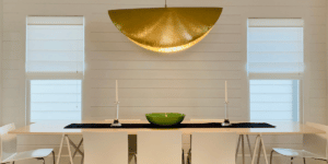 White Roman Shades lifted to expose windows in a modern Nashville, TN dining room