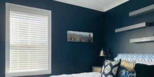 Corded Real Wood blinds with 2.5 inch slats in a blue bedroom in Decatur, GA