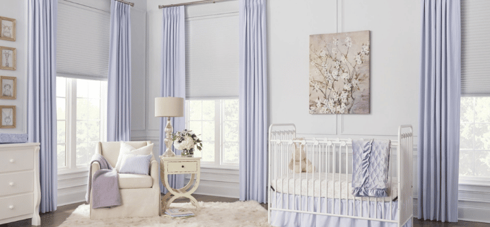 Grey Cellular Shades, also known as Honeycomb Shades, in a purple-highlighted nursery