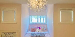 Chain Lift Blackout Roller Shades with cassette valances in a pink, Child's bedroom in Hendersonville, TN