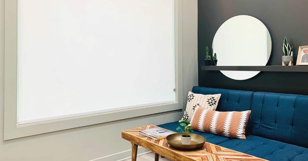 White Motorized Roller Shades cover a large window in a modern living space in Nashville, TN
