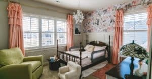 White, Hardwood Plantation Shutters featuring 3.5 inch louvers and divider rails in a colorful child's bedroom in Mount Juliet, TN