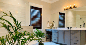 Dark-stained Hardwood Plantation Shutters with 4.5 inch louvers in a Brentwood, TN bathroom