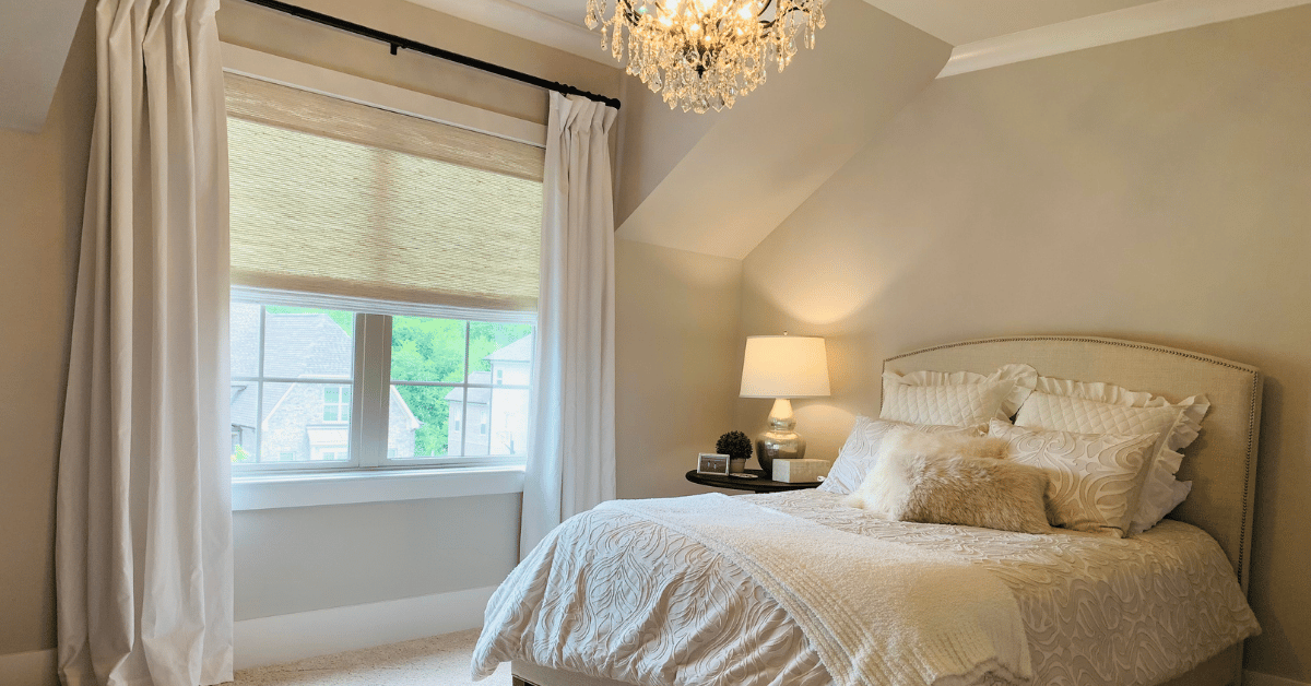 White Natural Woven Shades, also known as Tropical Woven Shades, with a privacy liner in a white Nolensville, TN bedroom