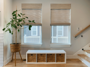 Motorized natural woven shades in living area